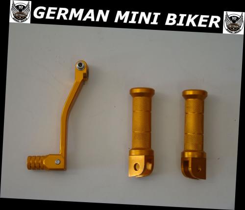 Artikelbild des Artikels “Aluschalthebel & Fußrasten GOLD CNC-ALU “